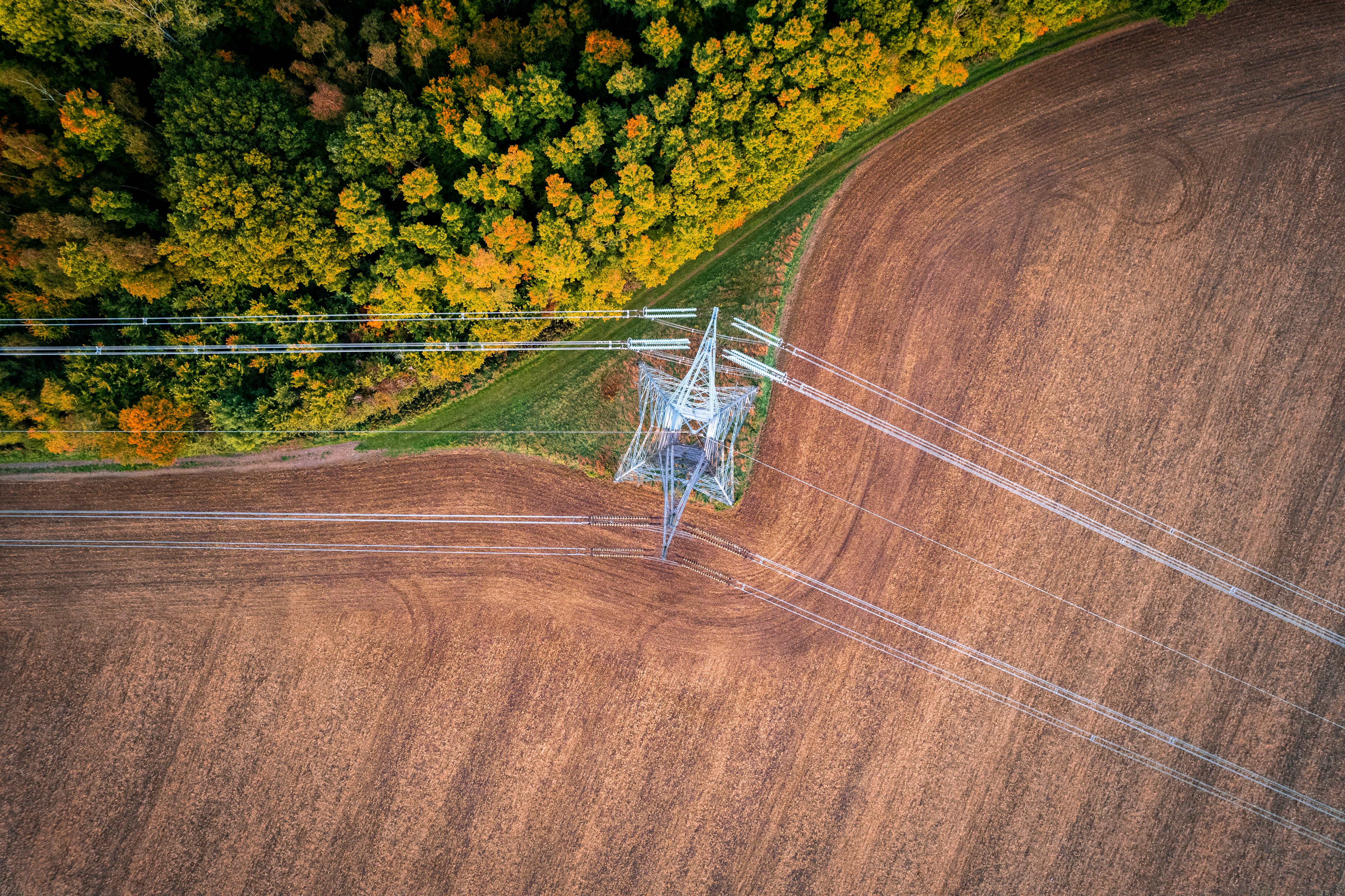Power line field aerial view